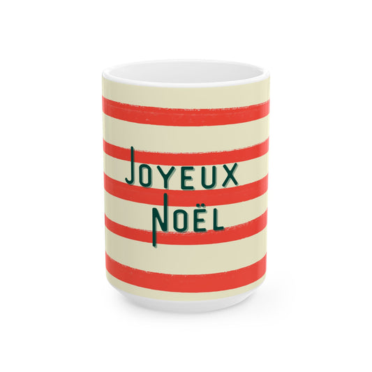 Mug with red and white stripes and 'Joyeux Noel' text on a white background