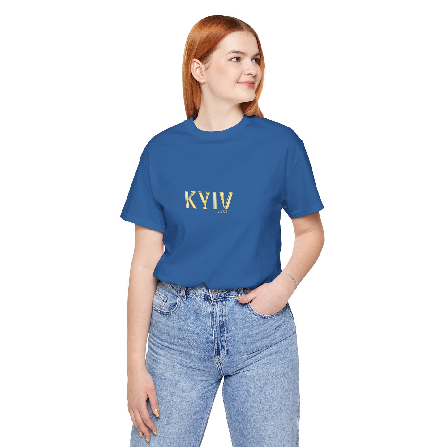 Person wearing a blue t-shirt with 'KYIV' printed on it against a white background