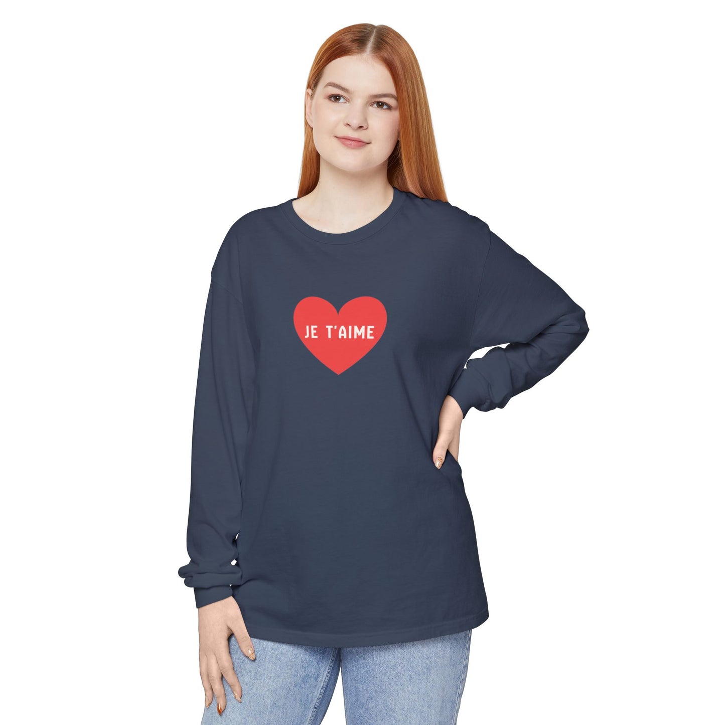 Woman wearing a navy blue long-sleeve shirt with a red heart and 'JE T'AIME' text on a white background
