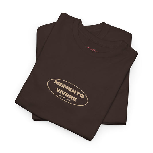 Folded brown t-shirt with 'Memento Vivere' logo on a white background