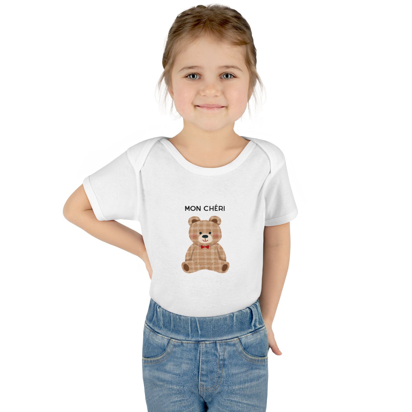 Child wearing a white t-shirt with a teddy bear graphic and text on a white background