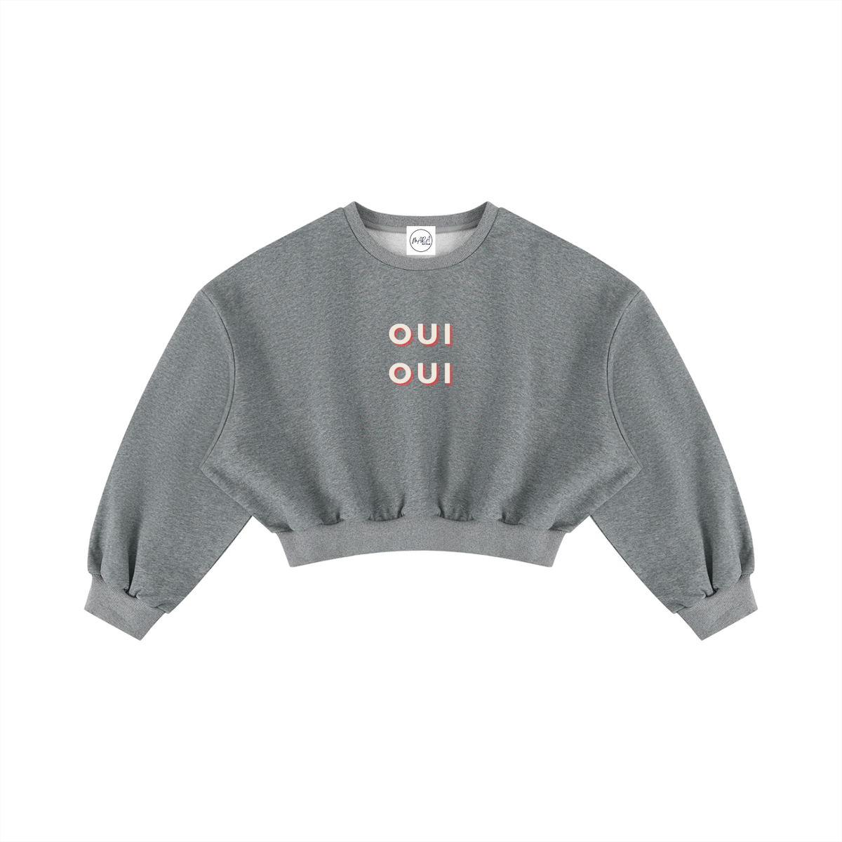 A heather gray cropped crewneck sweatshirt with 'OUI' printed in orange on the chest, displayed flat against a solid white background.