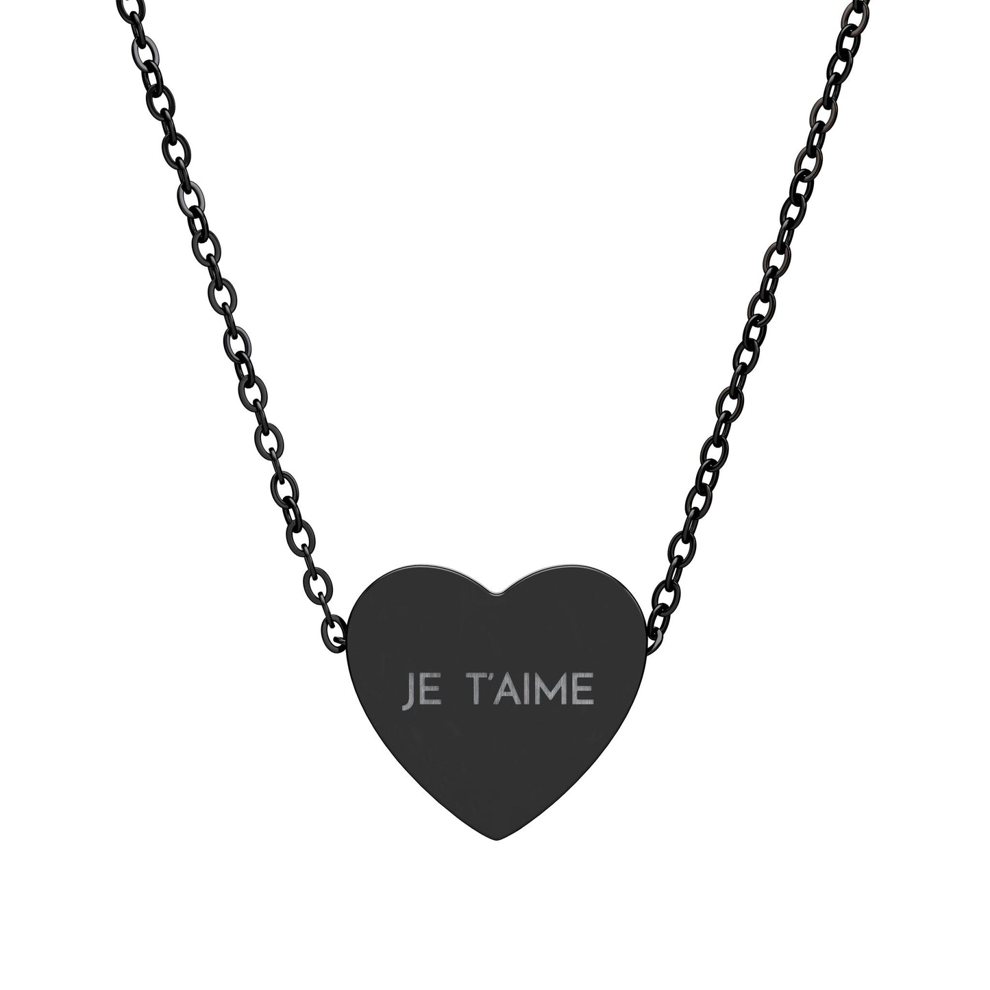 Black heart-shaped pendant with 'JE T'AIME' engraving on a chain against a white background