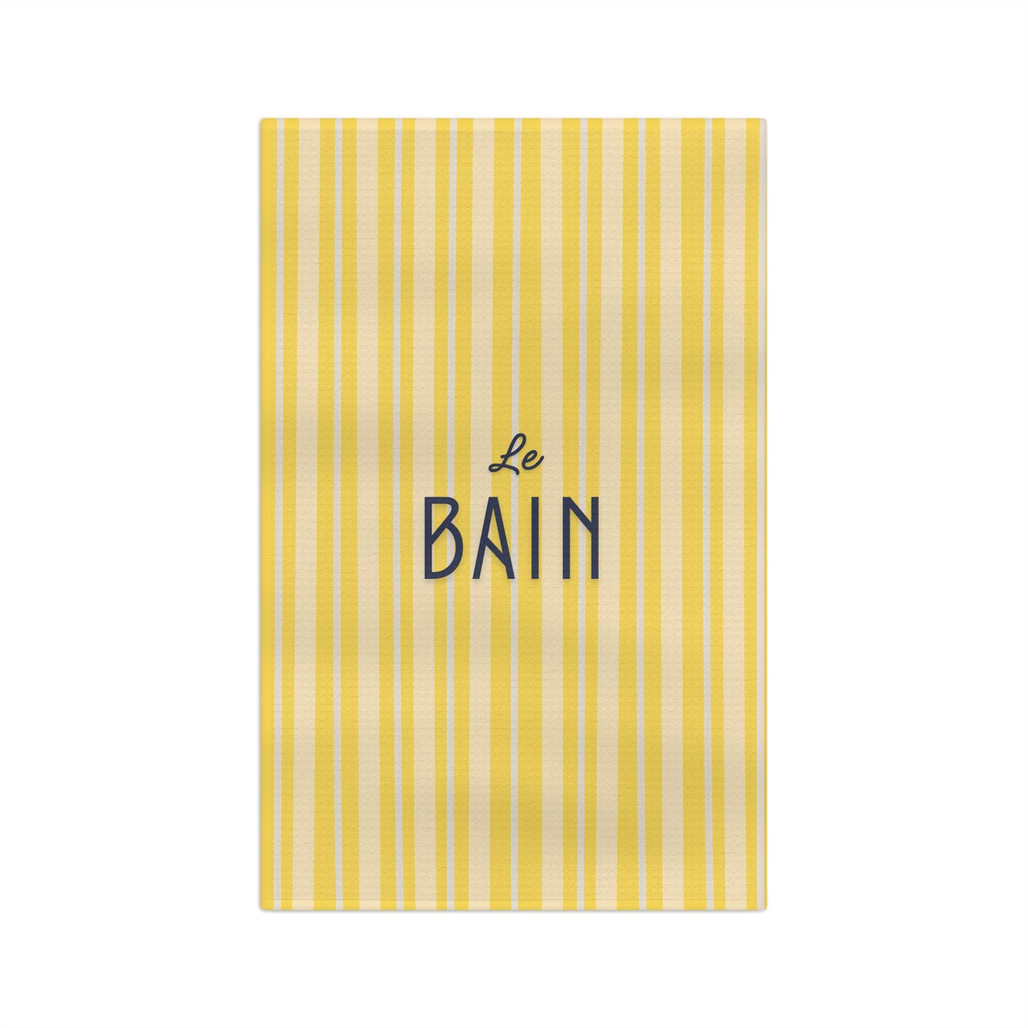 Yellow striped towel with 'Le Bain' text on a white background