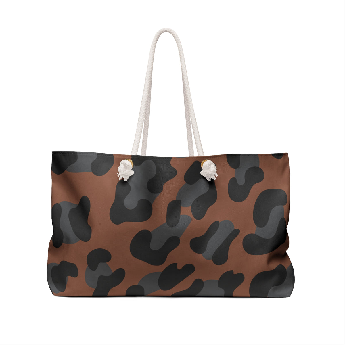 A tote bag with a brown and black leopard print pattern, featuring two thick off-white rope handles and two small white skull details on the front, set against a plain white background.
