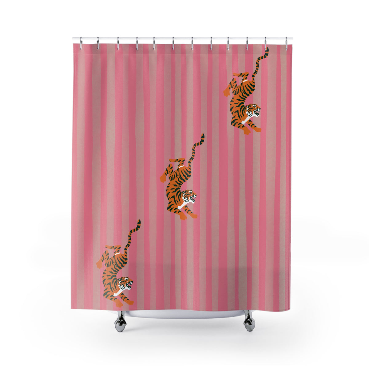 Pink striped shower curtain with three cartoon-style orange and black striped tiger illustrations, hanging from silver hooks on a white background.