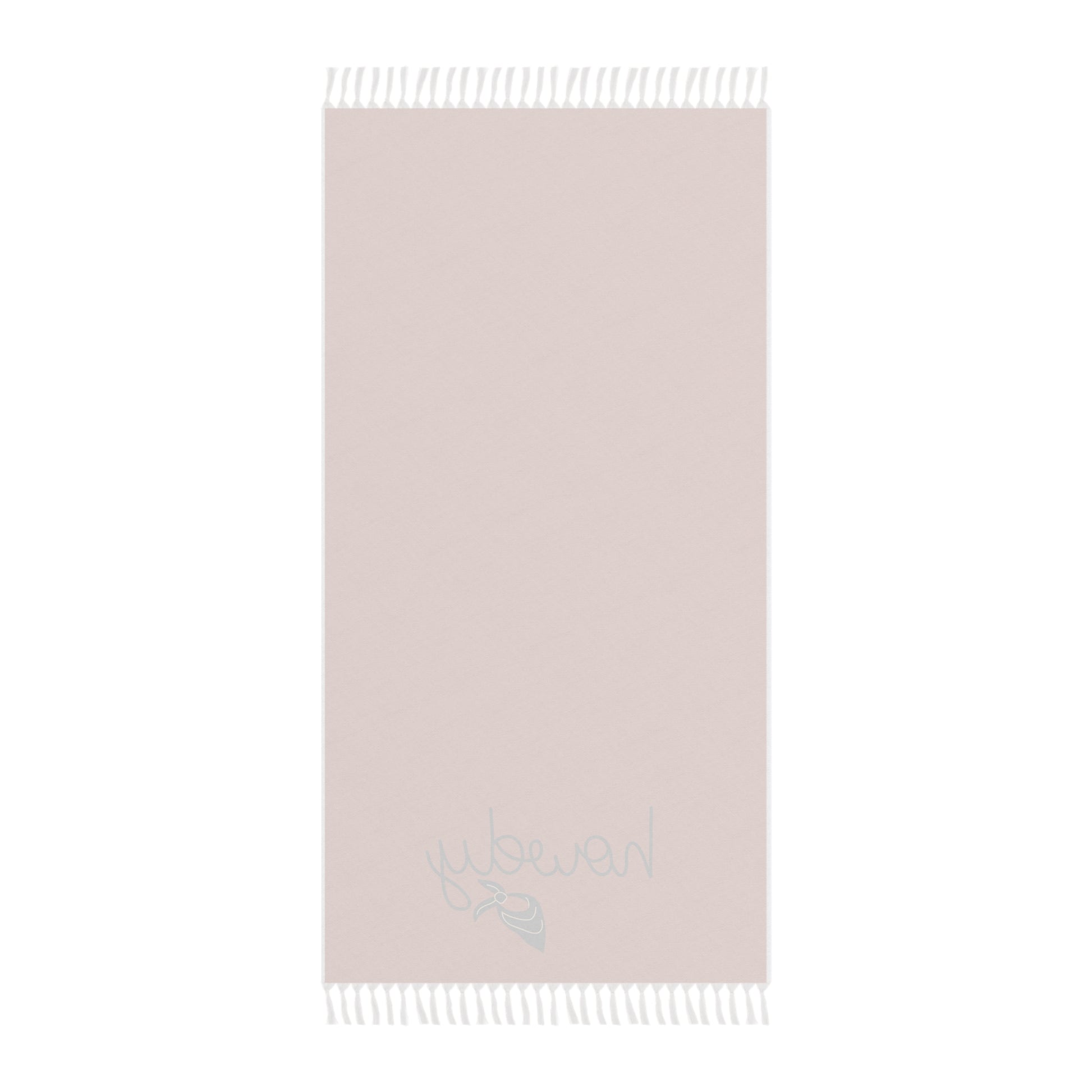 Light pink towel with white fringe on a white background