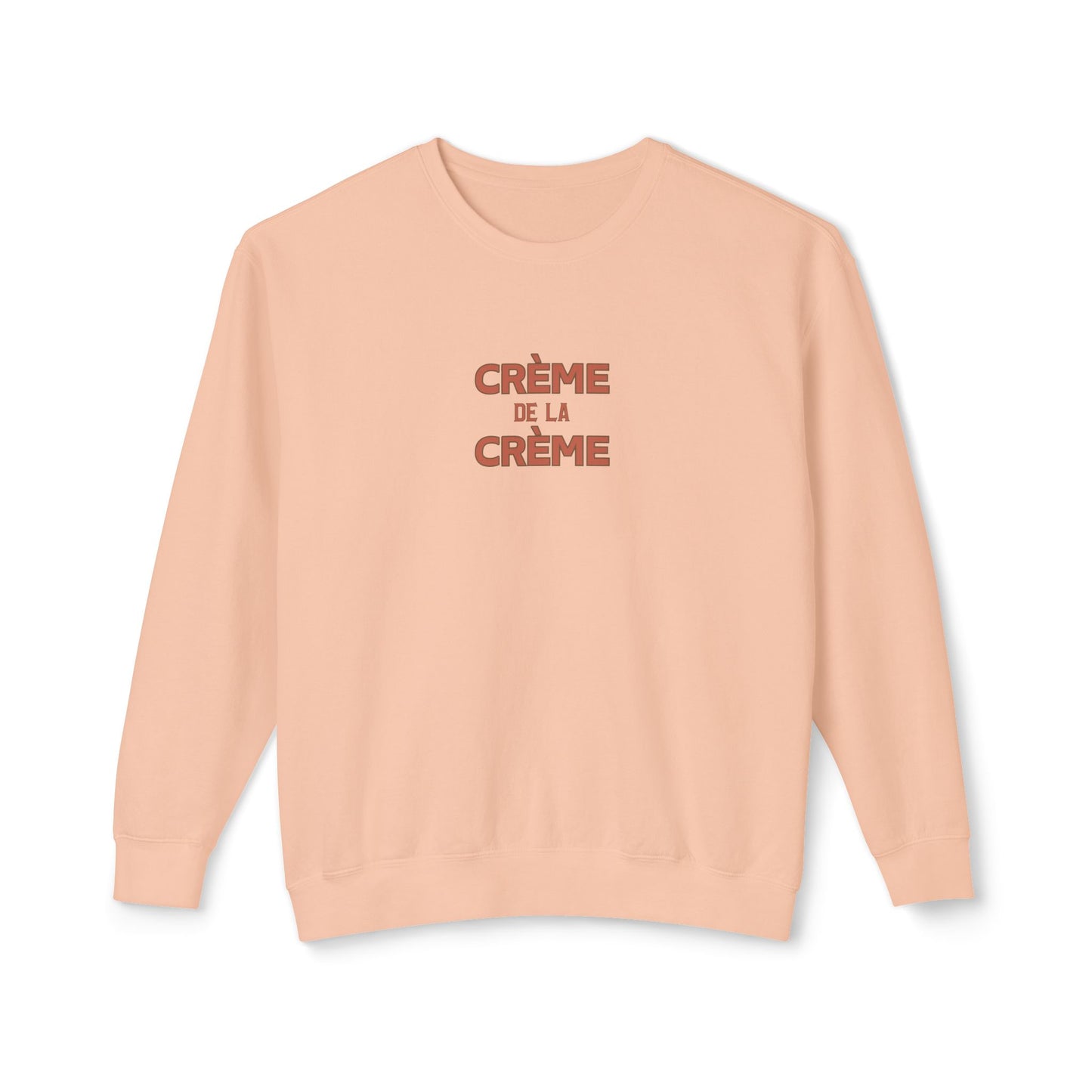 Beige sweatshirt with 'Crème de la Crème' text on a white background