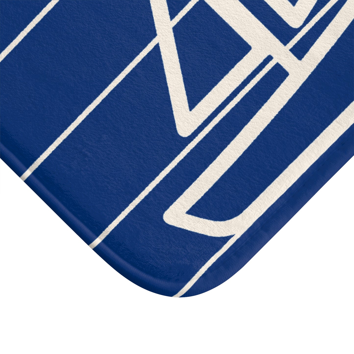 Blue mat with white geometric pattern