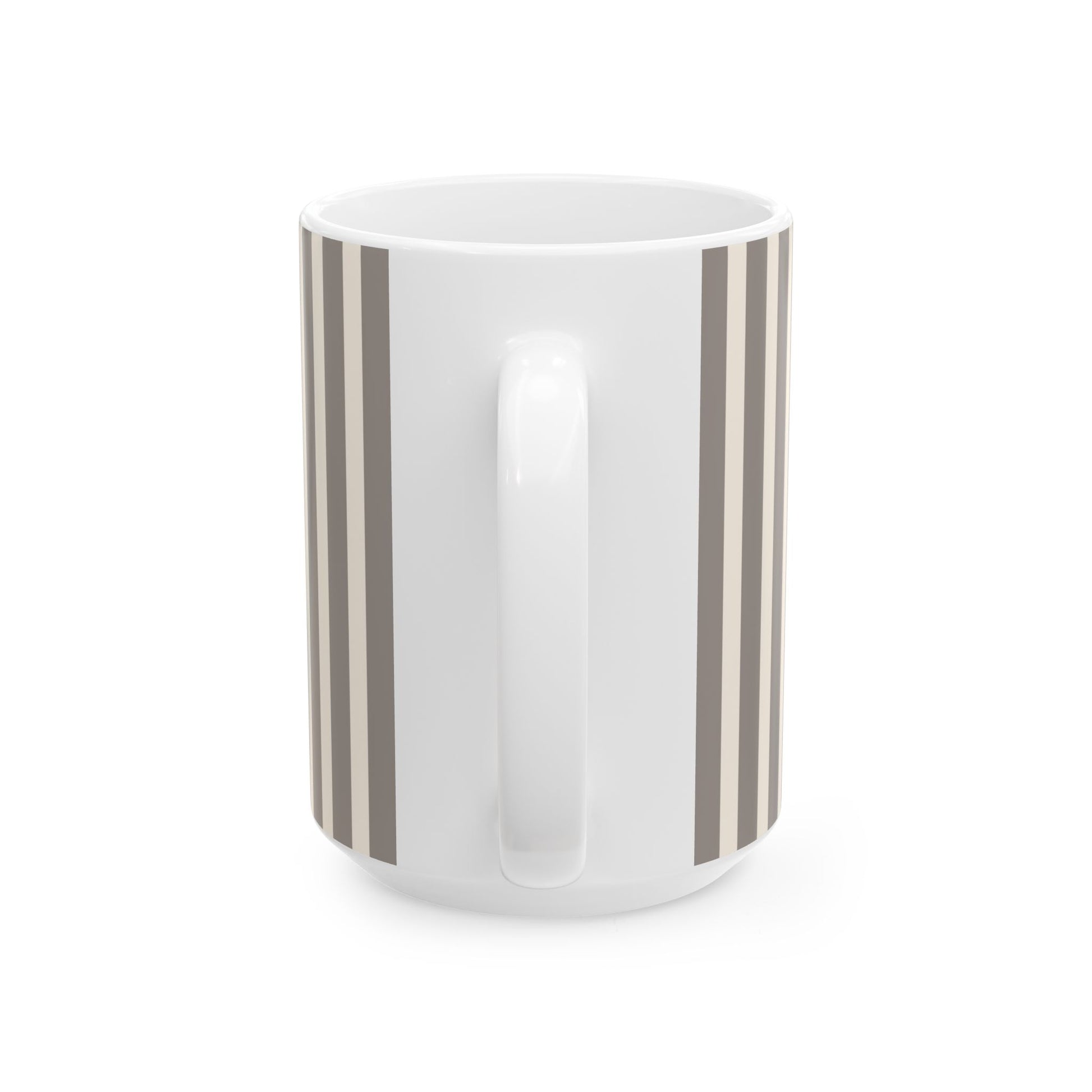 White mug with green leaf pattern on a white background
