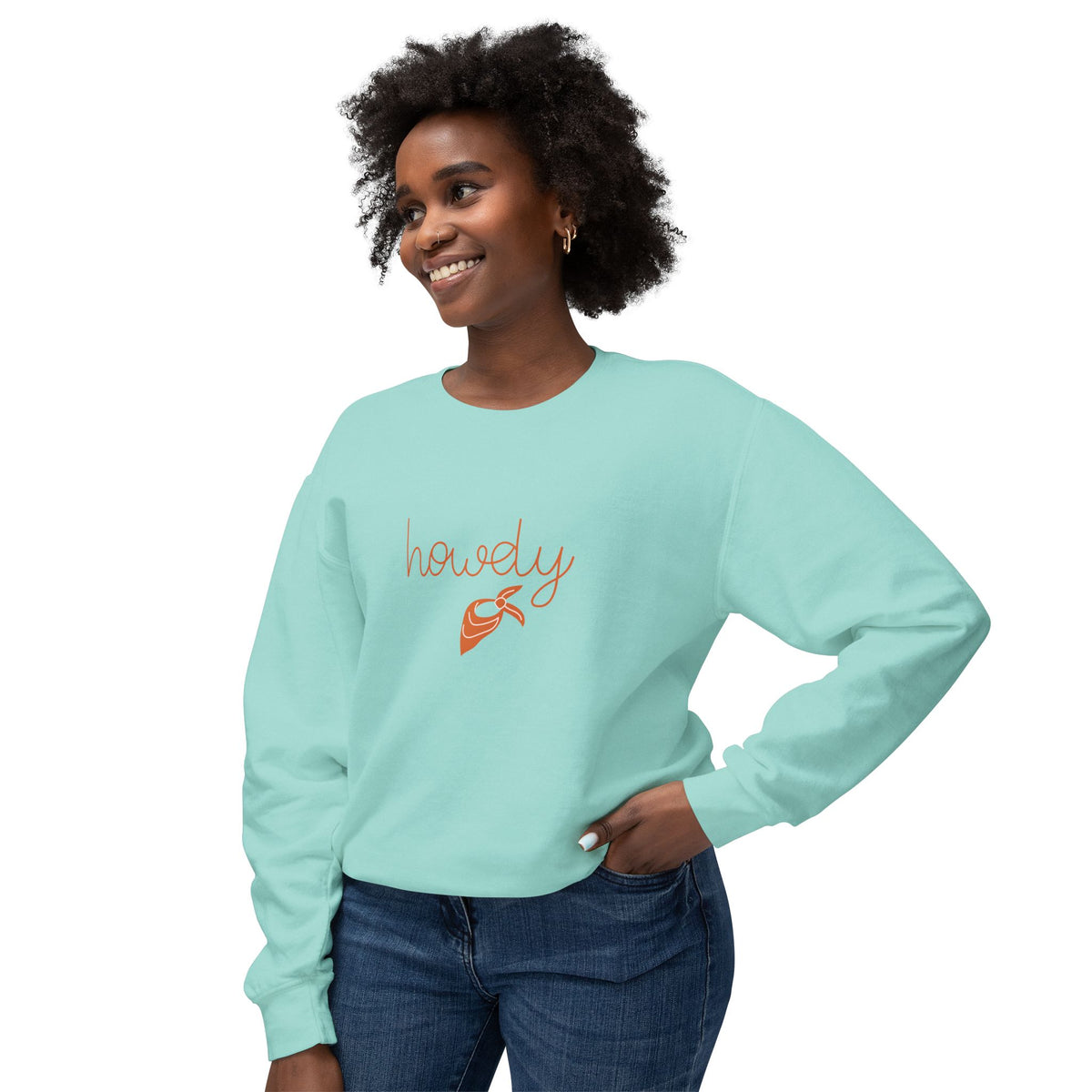 Woman wearing a light blue sweatshirt with text on a white background