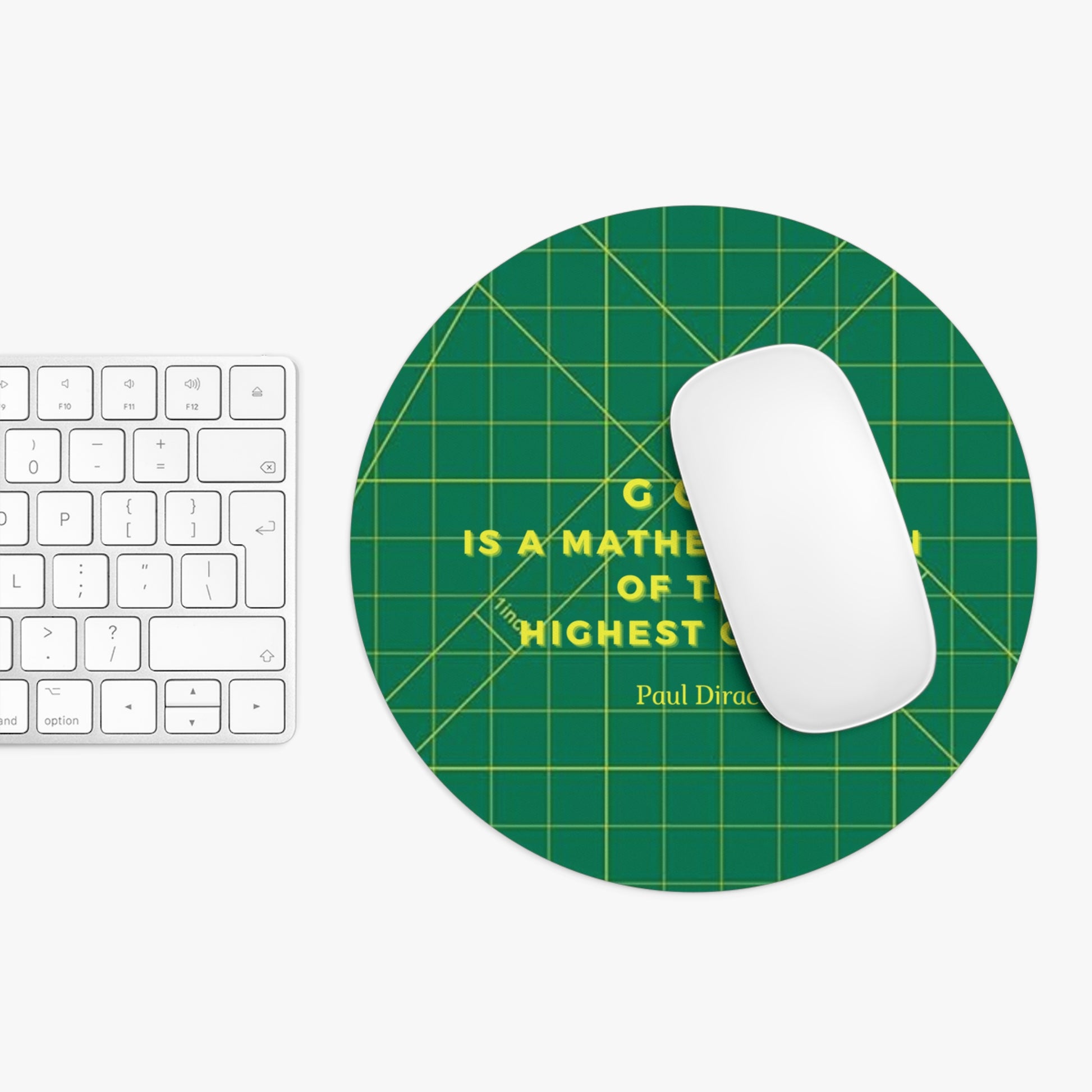 Green mouse pad with yellow text on a white surface with a keyboard and mouse.