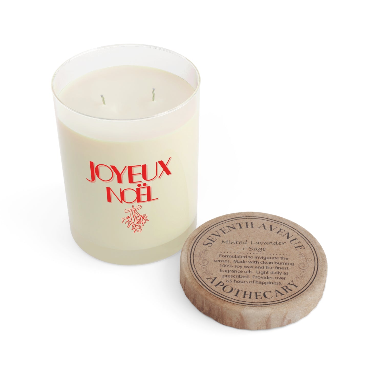 Candle with 'Joyeux Noel' text and Seventh Avenue Apothecary lid on a white background