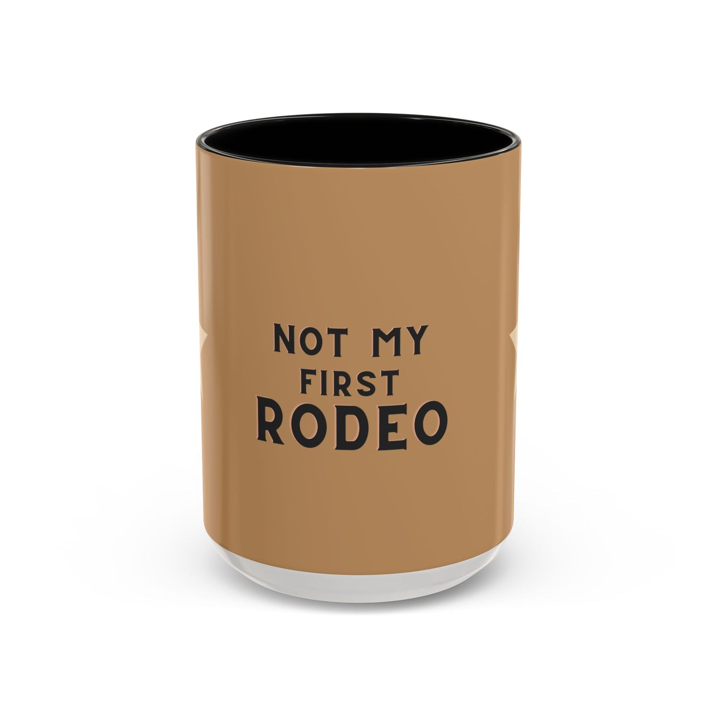 Brown tumbler with black text 'Not My First Rodeo' on a white background