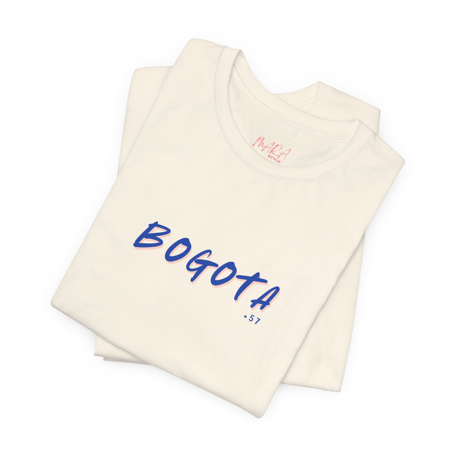 Folded tank top with 'BOGOTA' printed on it against a white background