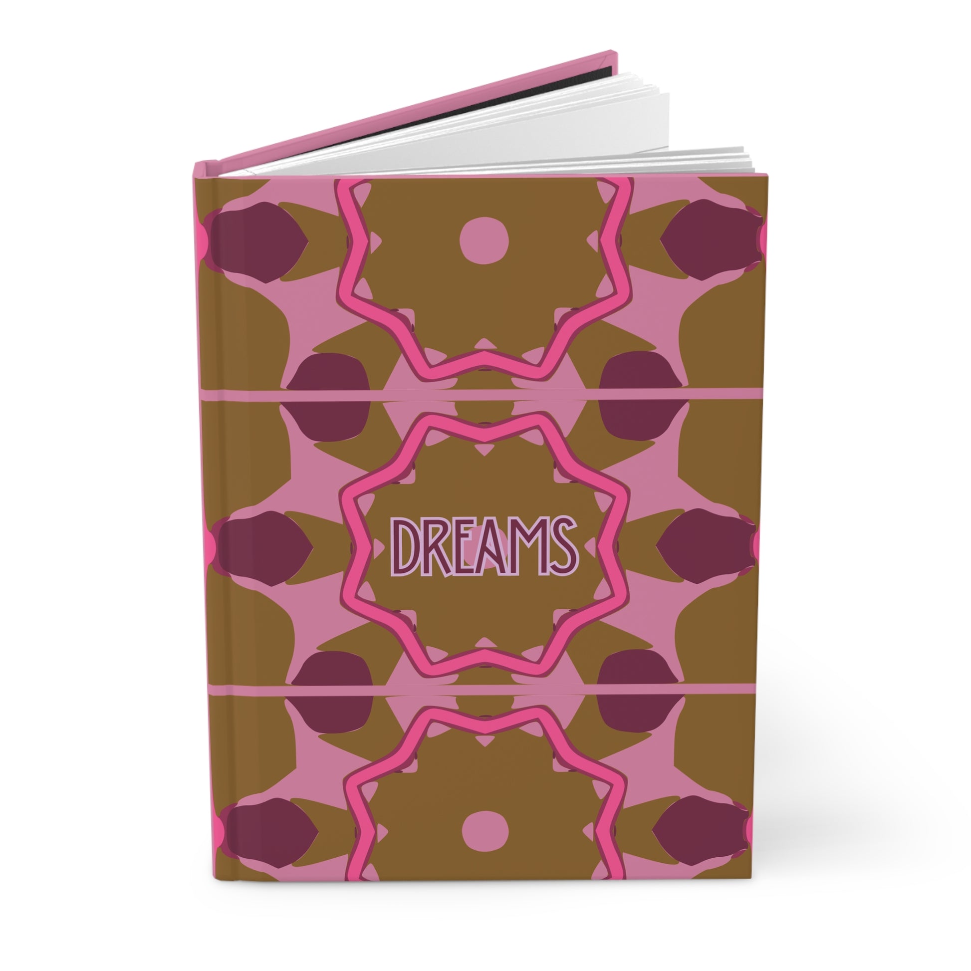 Notebook with a pink and brown geometric pattern on the cover, featuring the word 'DREAMS'.