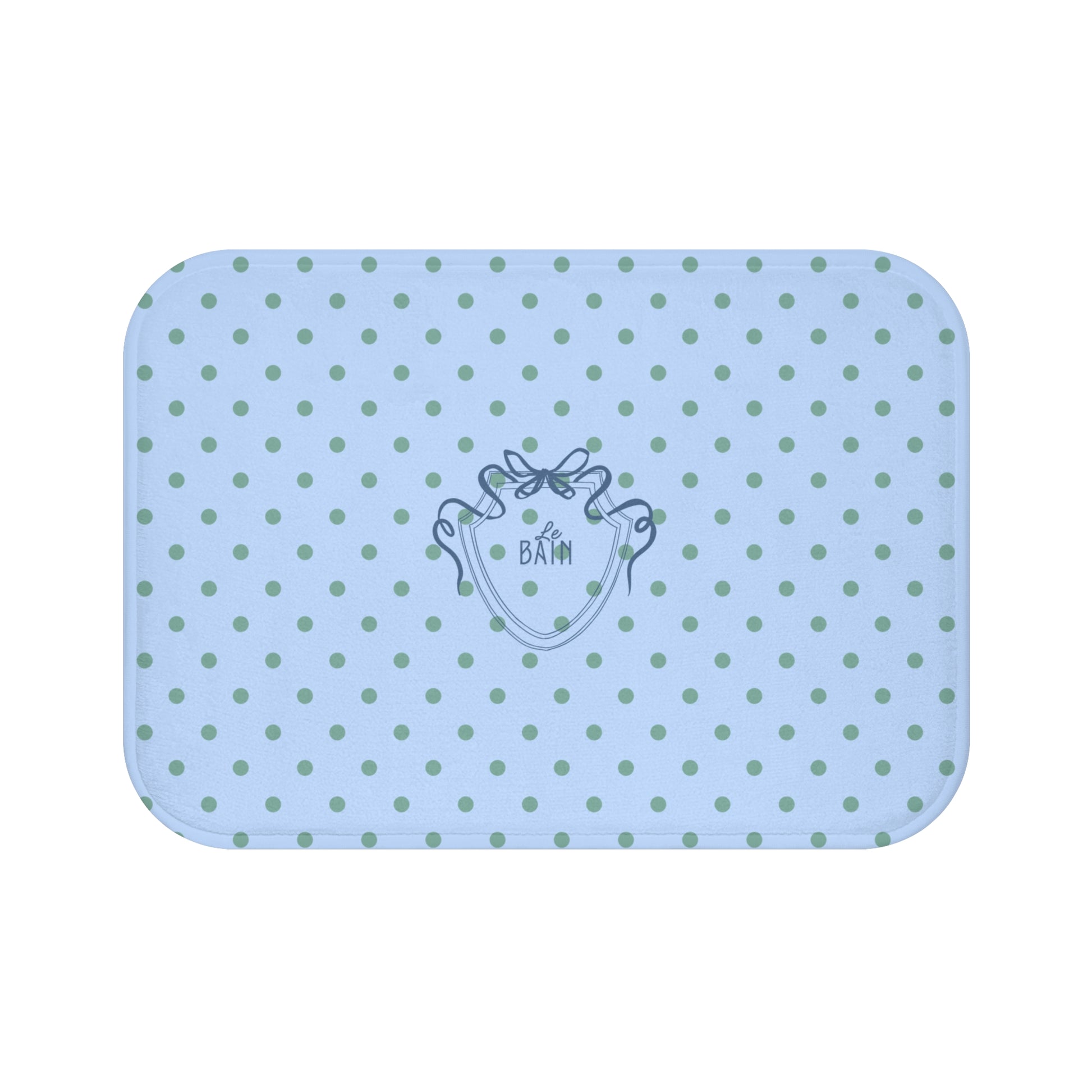 Blue polka dot mat with a brand logo on a white background