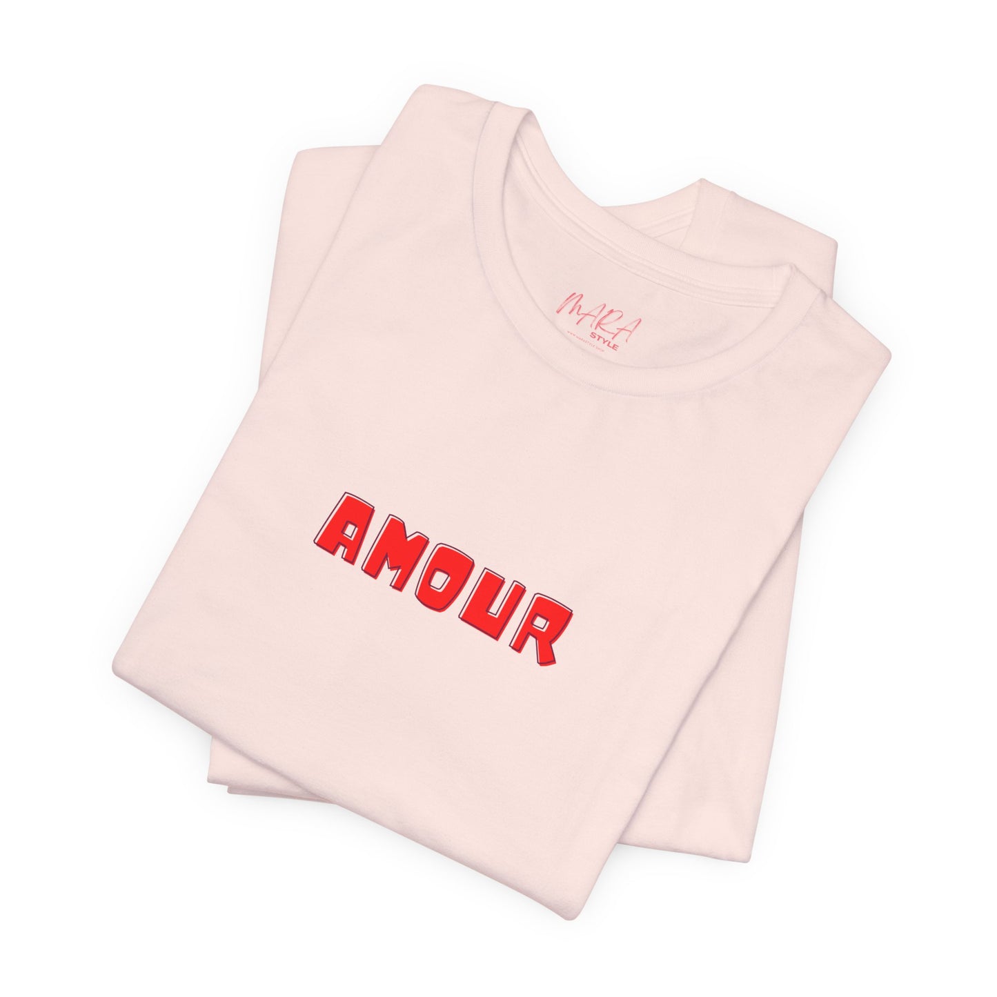 Folded pink tank top with 'AMOUR' printed in red on a white background