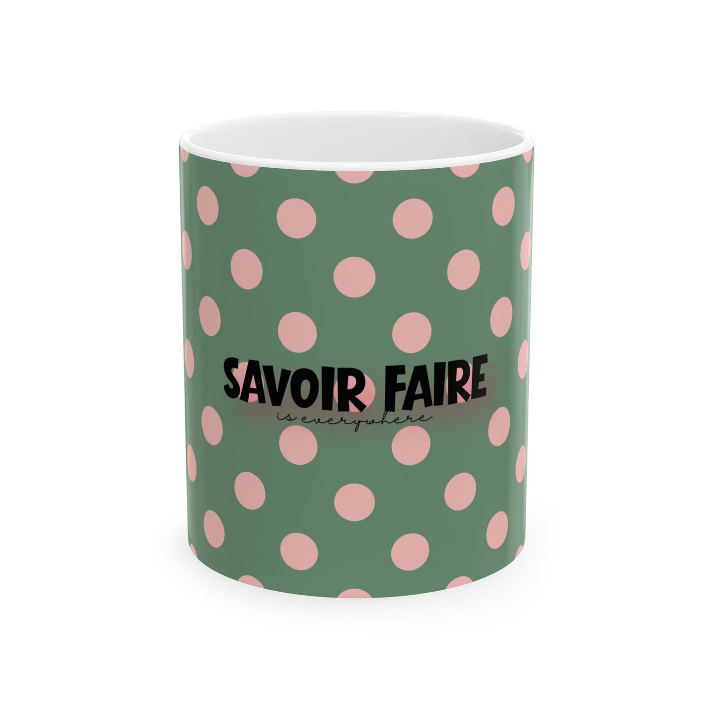 Green mug with pink polka dots and 'Savoir Faire' text on a white background