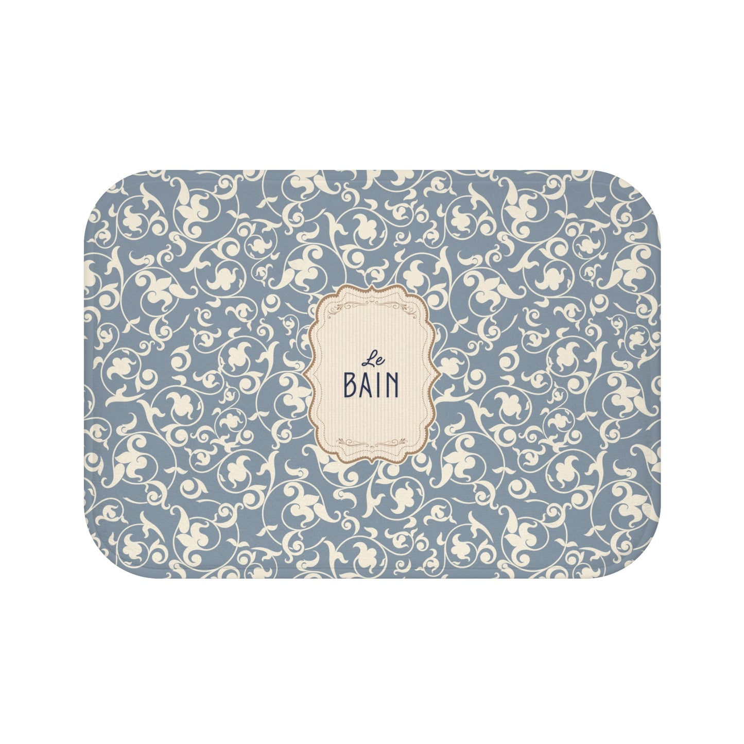 Decorative bath mat with blue and beige pattern and 'Le Bain' text on a white background