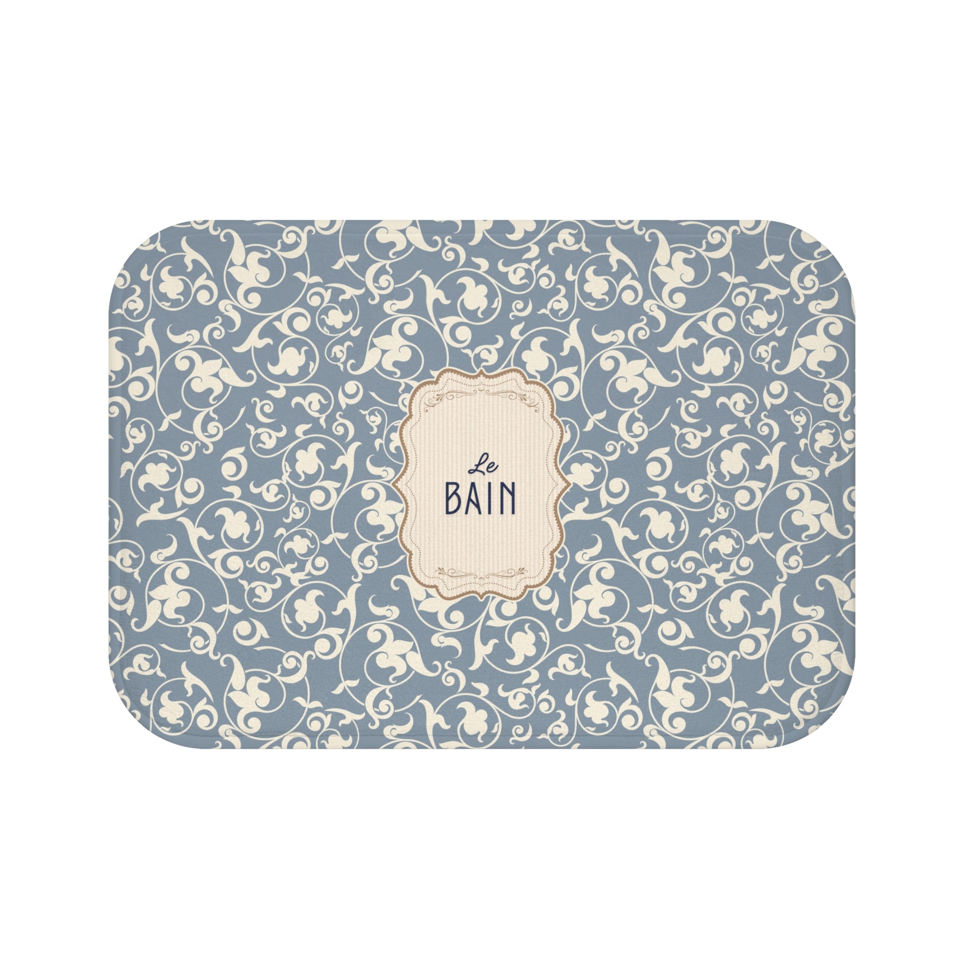 Decorative bath mat with blue and beige pattern and 'Le Bain' text on a white background