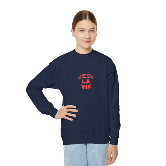 Person wearing a navy C'est La Vie sweatshirt on a white background