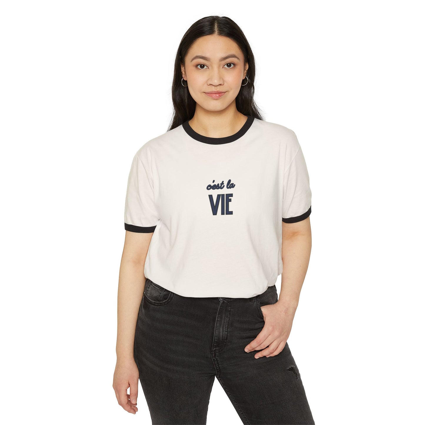 Woman wearing a white t-shirt with 'C'est la Vie' text on a white background