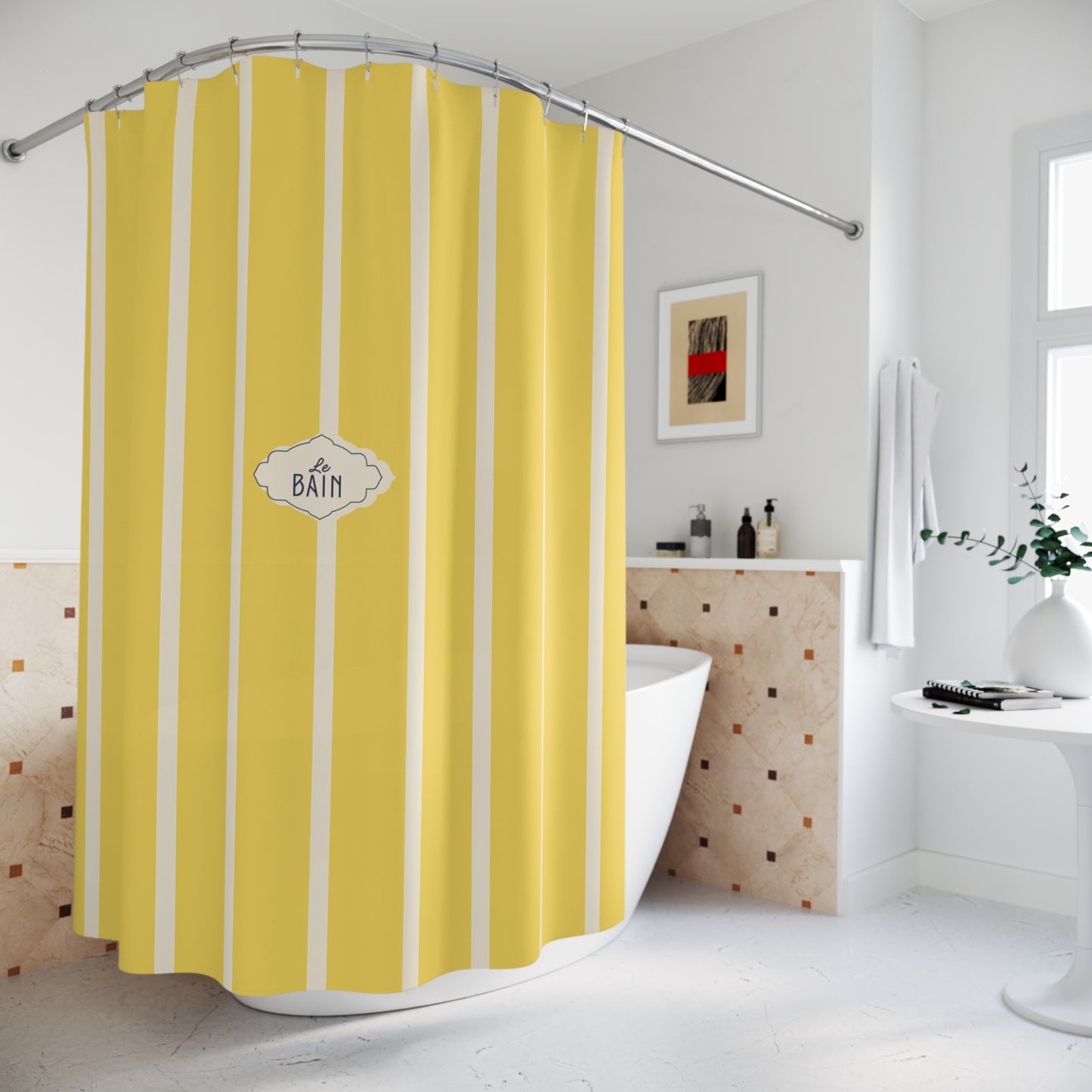 Yellow and white vertically striped shower curtain with a central 'BATH' label, hanging in a bright modern bathroom next to a bathtub.