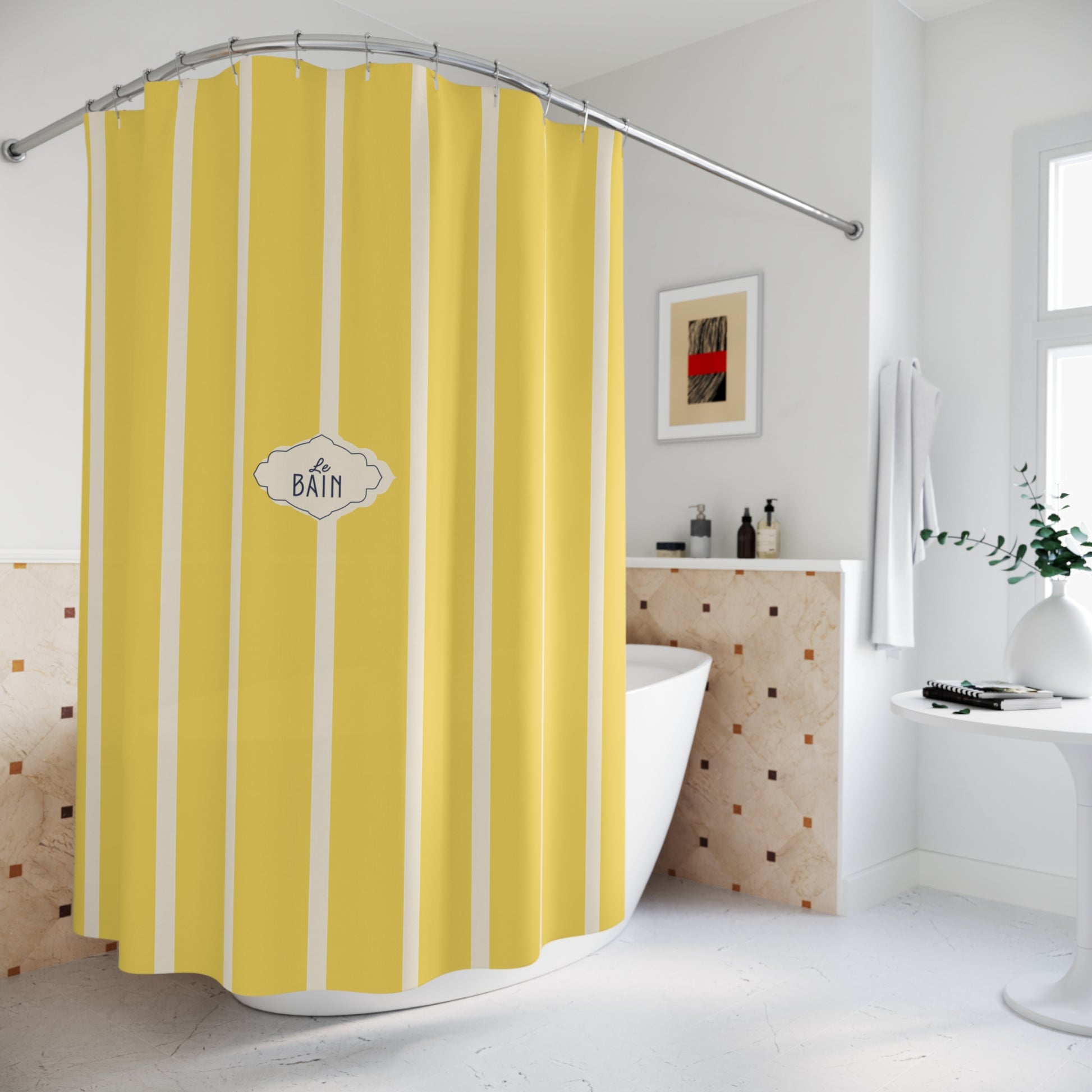 Yellow and white vertically striped shower curtain with a central 'BATH' label, hanging in a bright modern bathroom next to a bathtub.