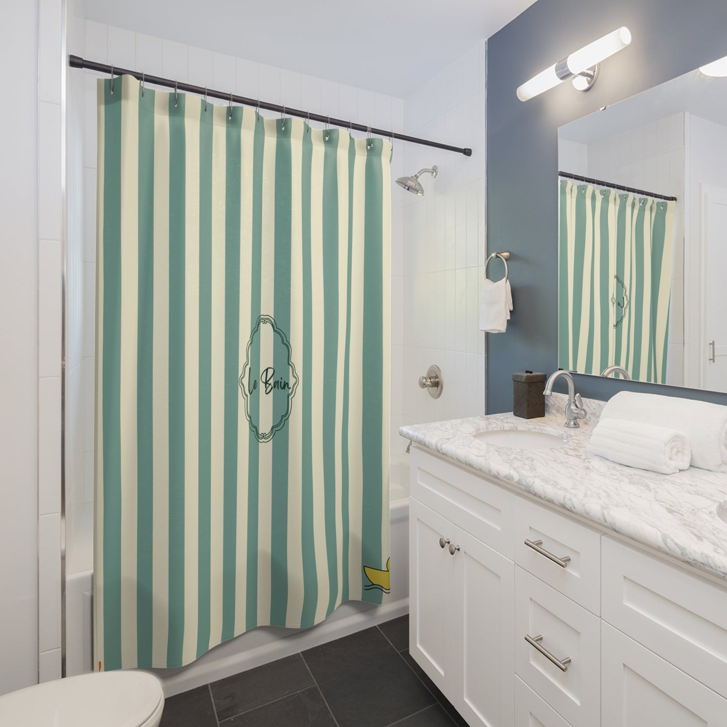 Bathroom with a striped shower curtain, sink, and mirror.