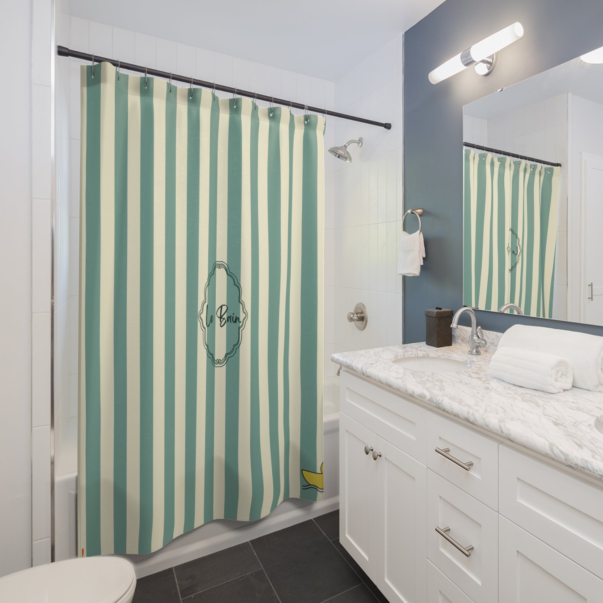Bathroom with a striped shower curtain, sink, and mirror.