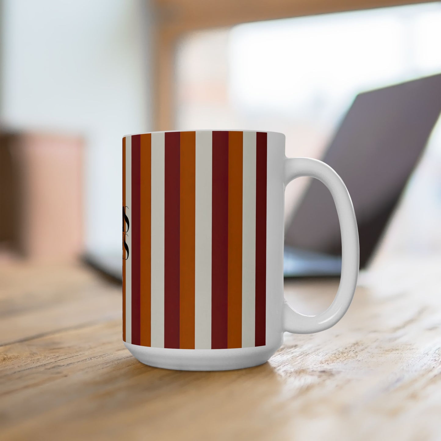 Mug with striped pattern on a wooden surface