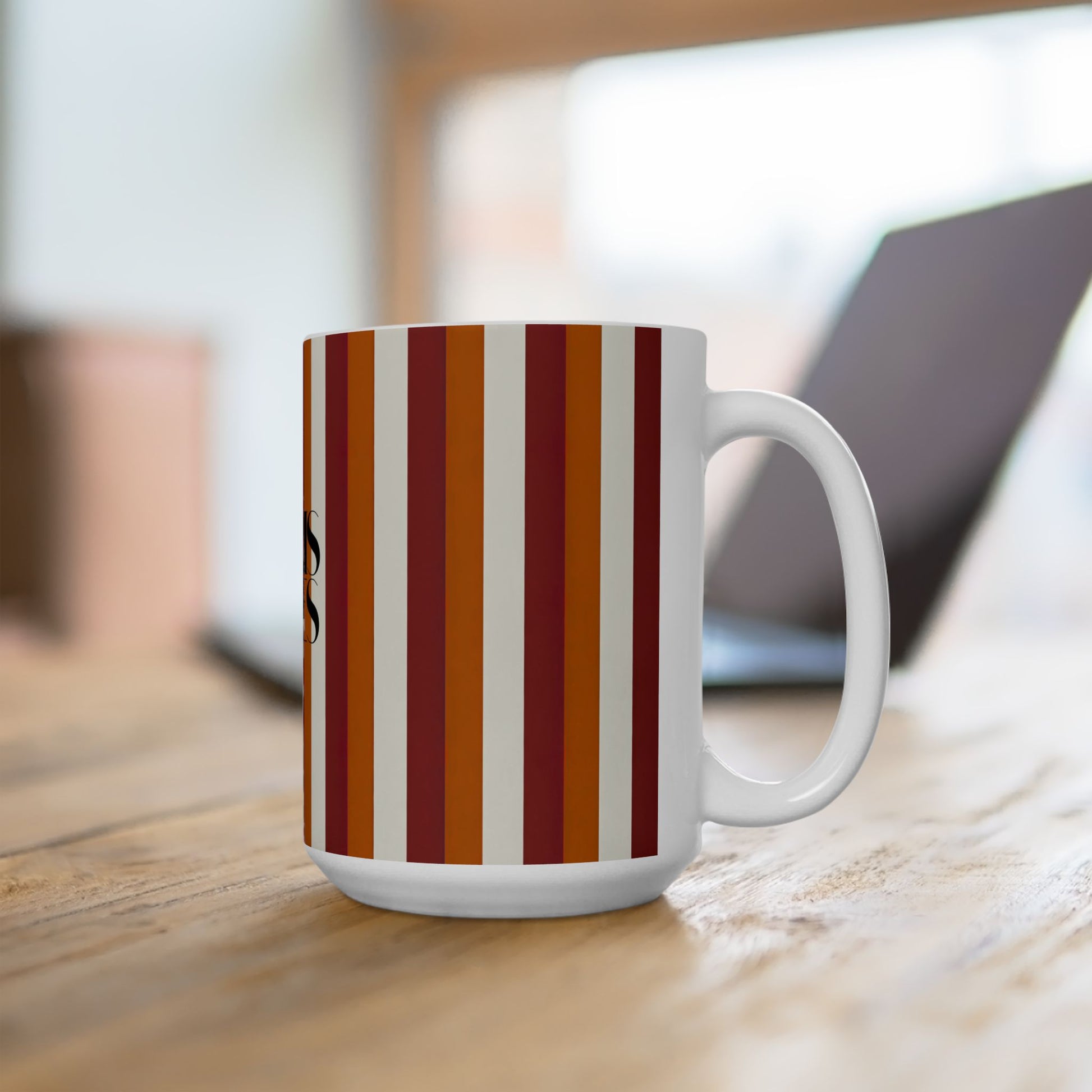 Mug with striped pattern on a wooden surface