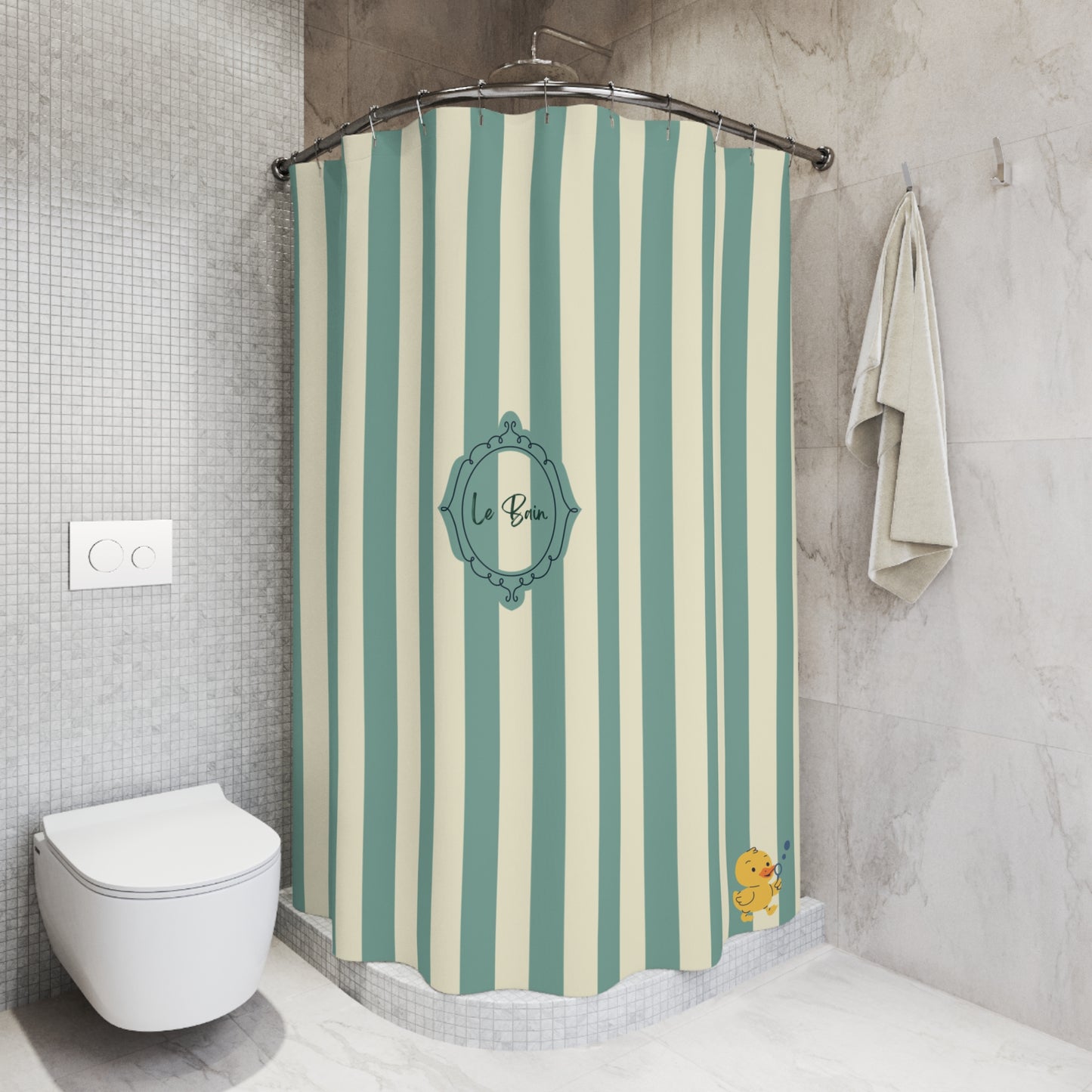 A shower curtain with vertical mint green and cream stripes, featuring a central teal decorative frame with the text 'le Bain' and a small yellow duck character in the bottom right corner. The curtain is shown hanging in a modern tiled bathroom next to a white toilet and a hanging towel.