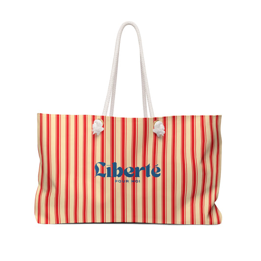 Striped bag with 'Liberté' text on a white background