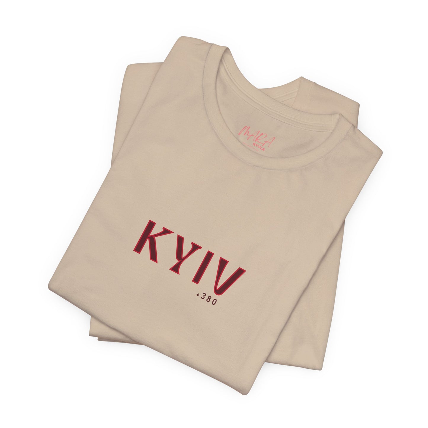 Beige t-shirt with 'KYIV 380' printed in red on a white background