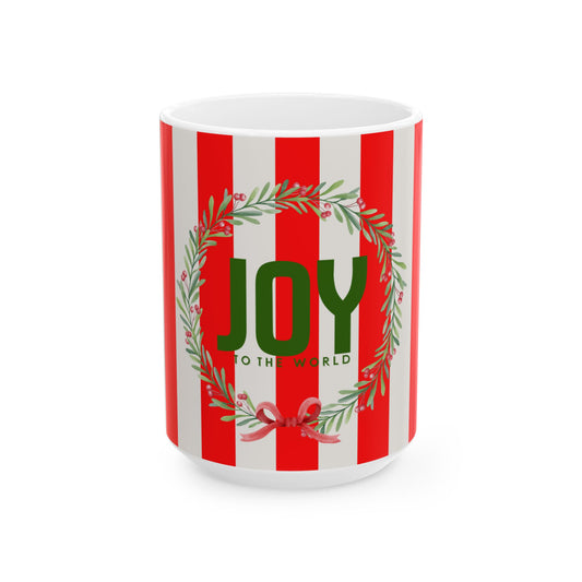 Mug with red and white striped pattern and green text 'JOY TO THE WORLD' on a white background