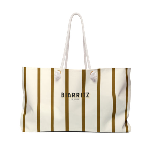 Striped tote bag with 'BIARRITZ FRANCE' text on a white background
