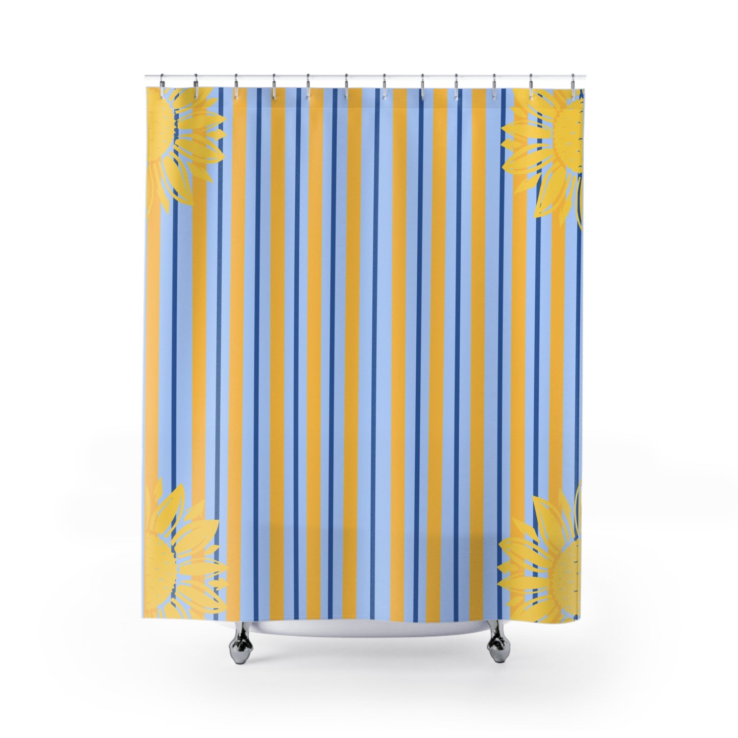 A shower curtain featuring a vertical stripe pattern in light blue, medium blue, and mustard yellow, with yellow tropical palm leaf prints at the corners, shown hanging from silver hooks on a white background.