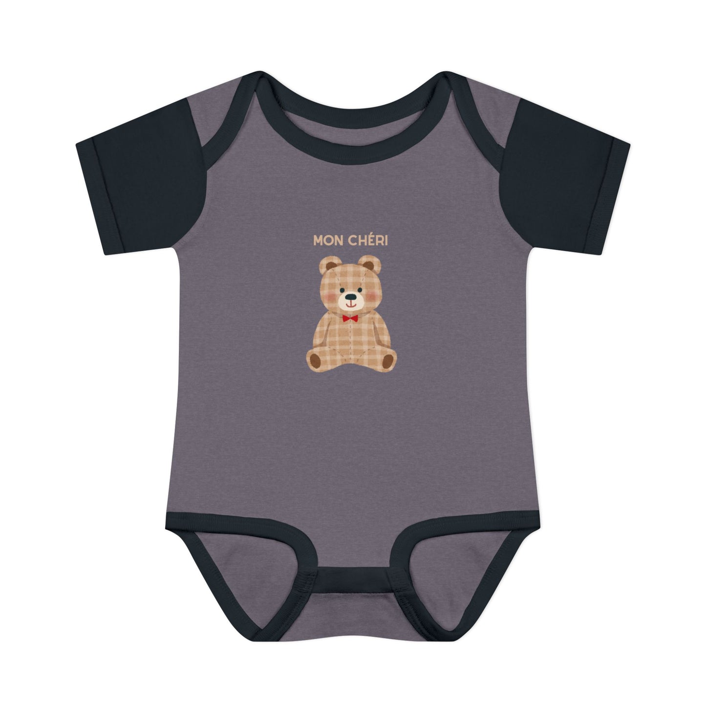 Gray baby onesie with a teddy bear design and 'MON CHÓRI' text on a white background