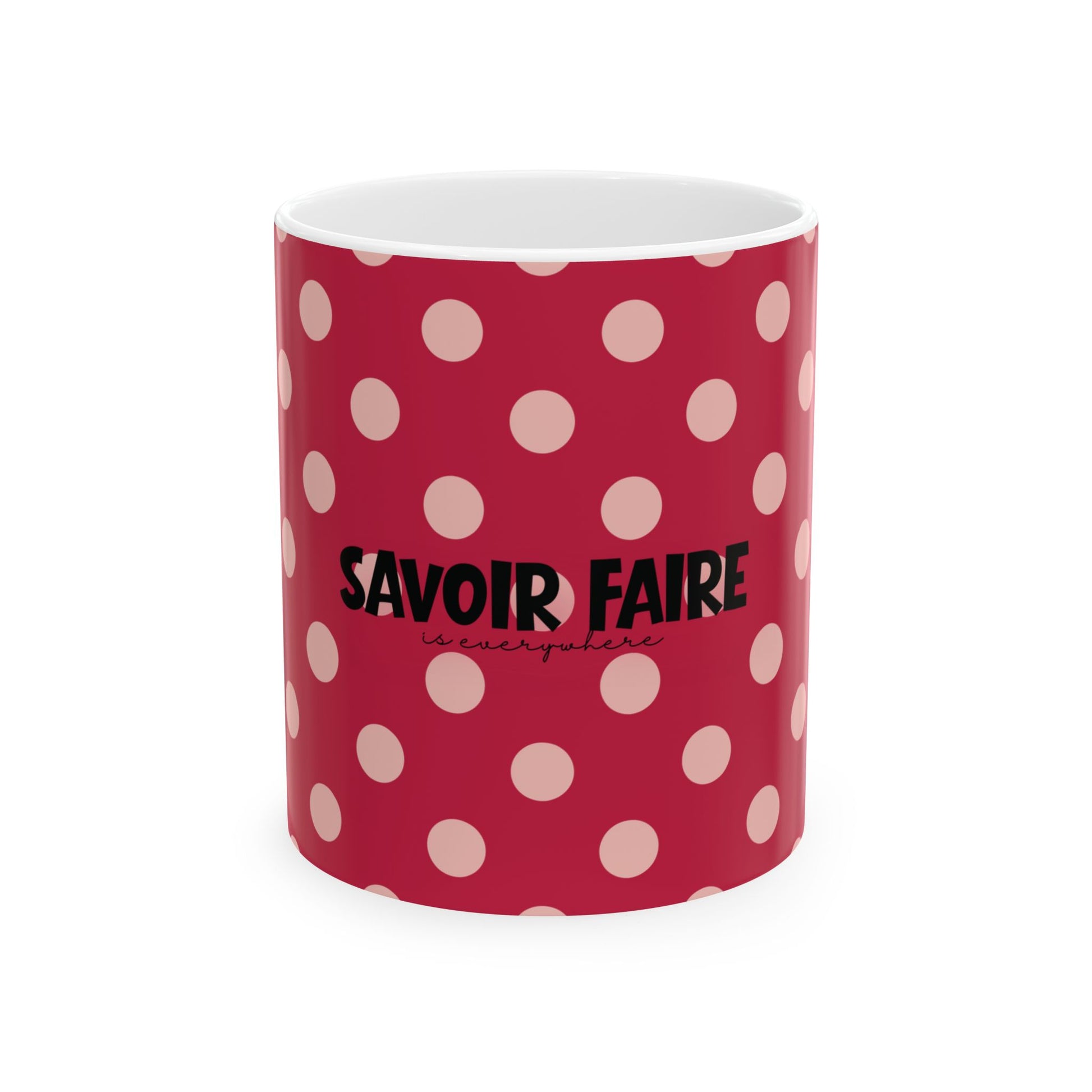 Red mug with white polka dots and 'SAVOIR FAIRE' text on a white background