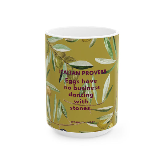 Mug with olive design and Italian proverb text on a white background