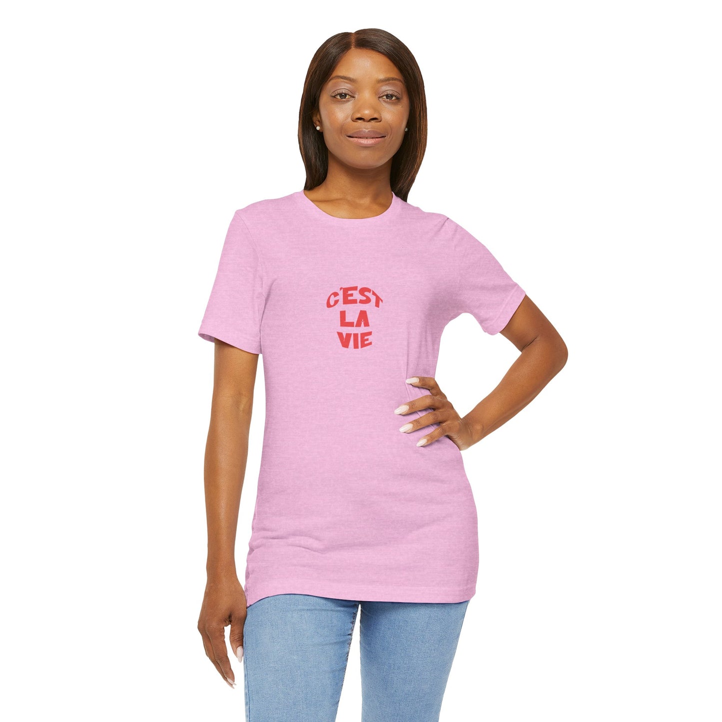 Woman wearing a pink t-shirt with text on a white background
