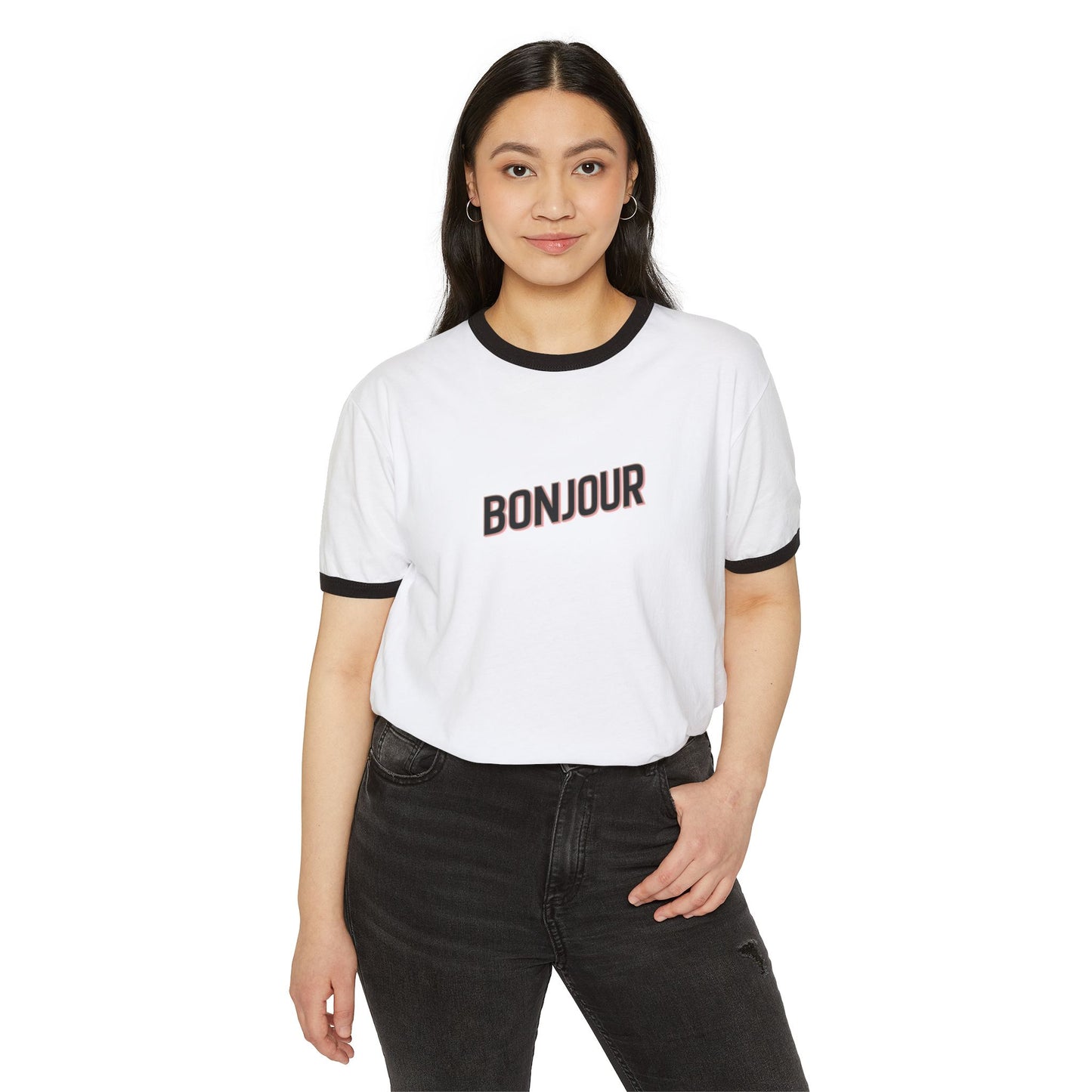 Woman wearing a white t-shirt with 'Bonjour' text on a white background