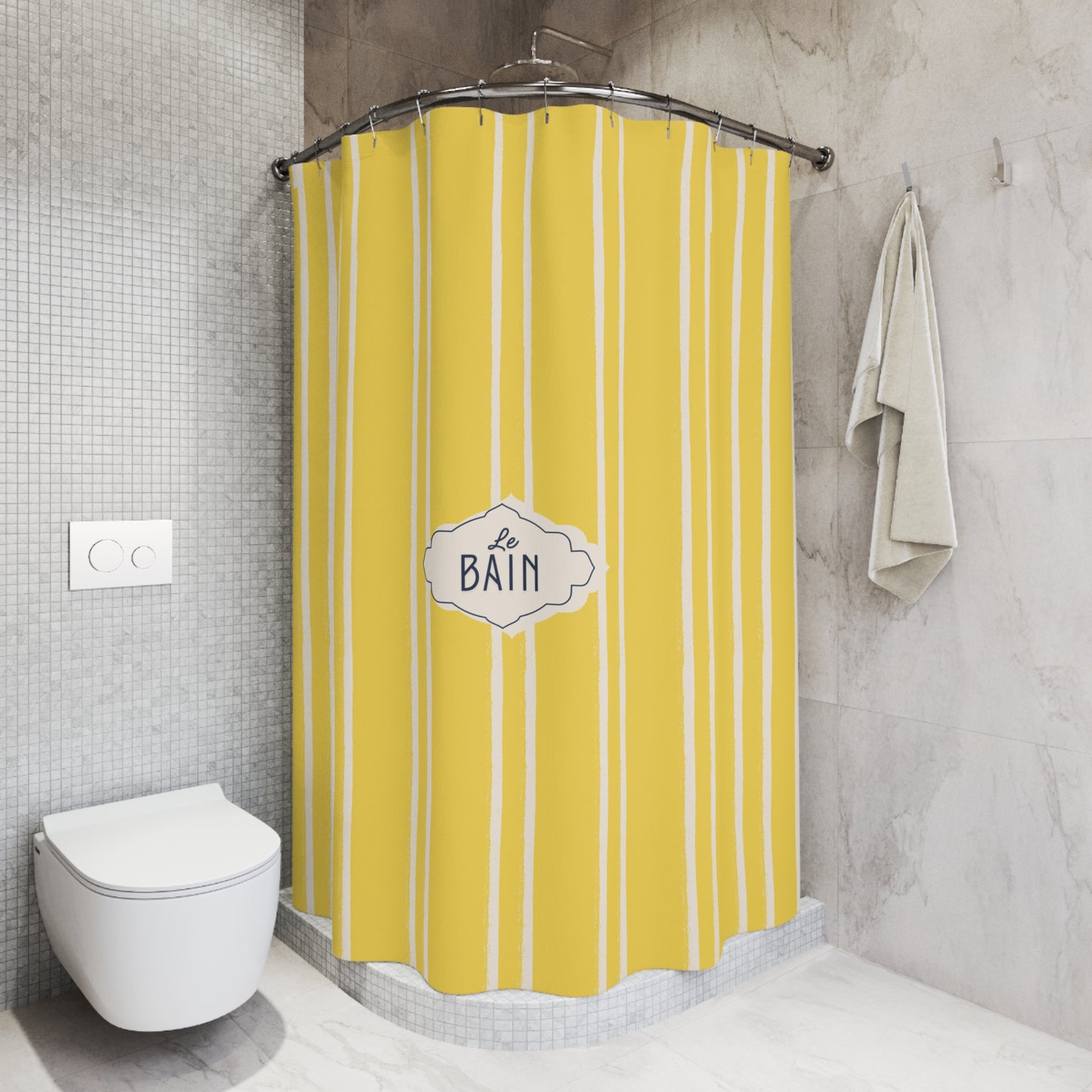 Yellow striped shower curtain with 'Le Bain' label in a bathroom setting