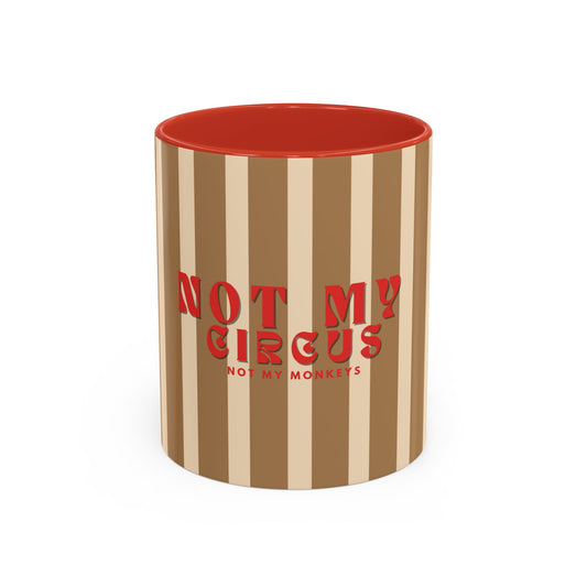 Striped mug with red interior and 'Not My Circus, Not My Monkeys' text on a white background