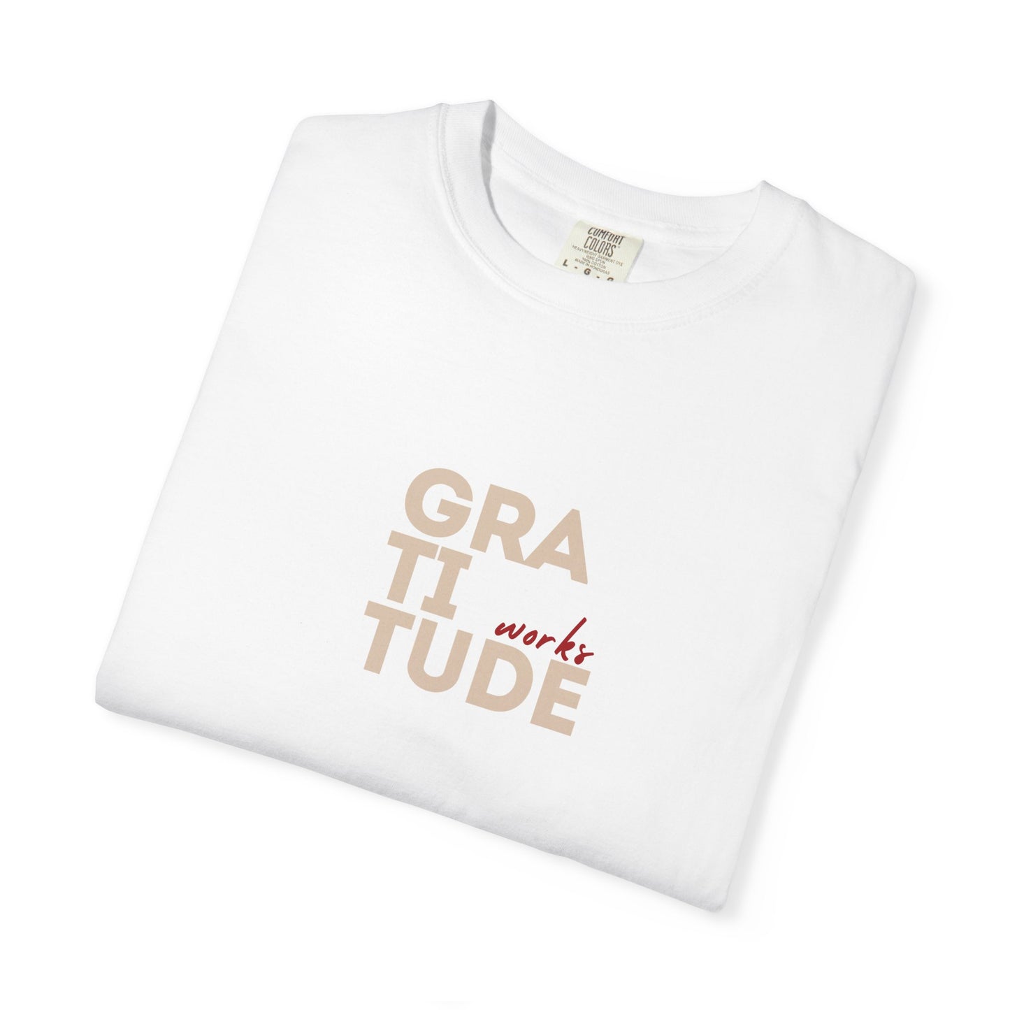 White t-shirt with 'GRATITUDE' text on a white background
