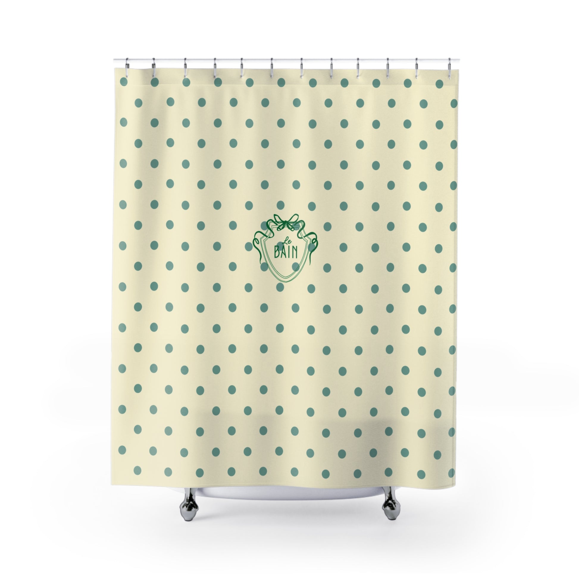 Shower curtain with polka dot pattern and logo on a beige background