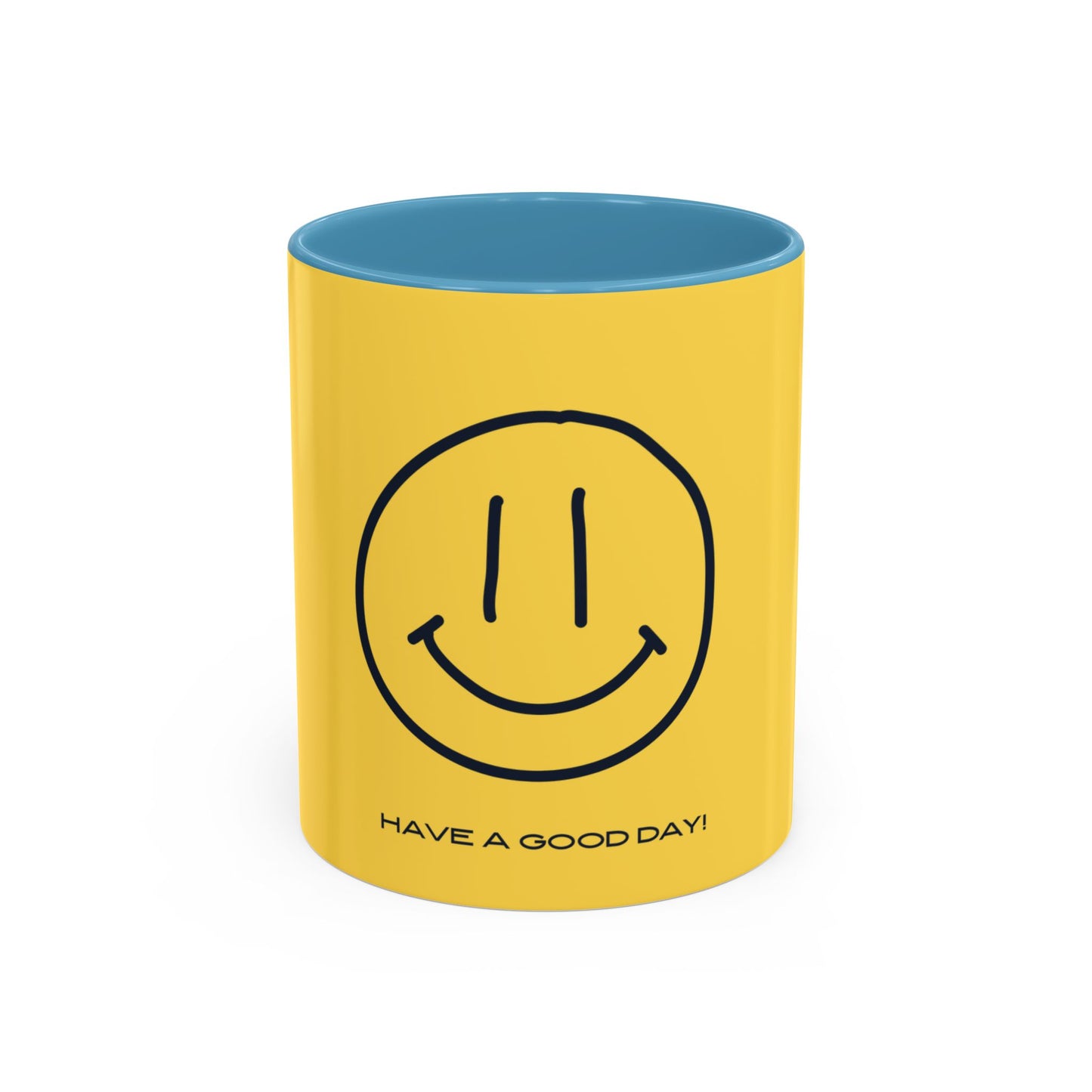Yellow mug with smiley face and 'Have a good day!' text on a white background