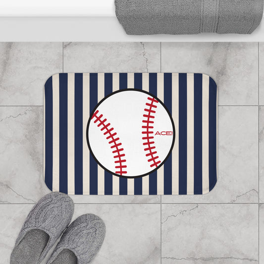 Doormat with baseball design and striped pattern on a tiled floor.